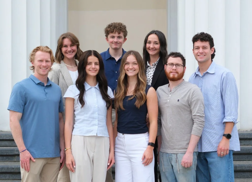 UMBP intern cohort on the steps in Chișinău